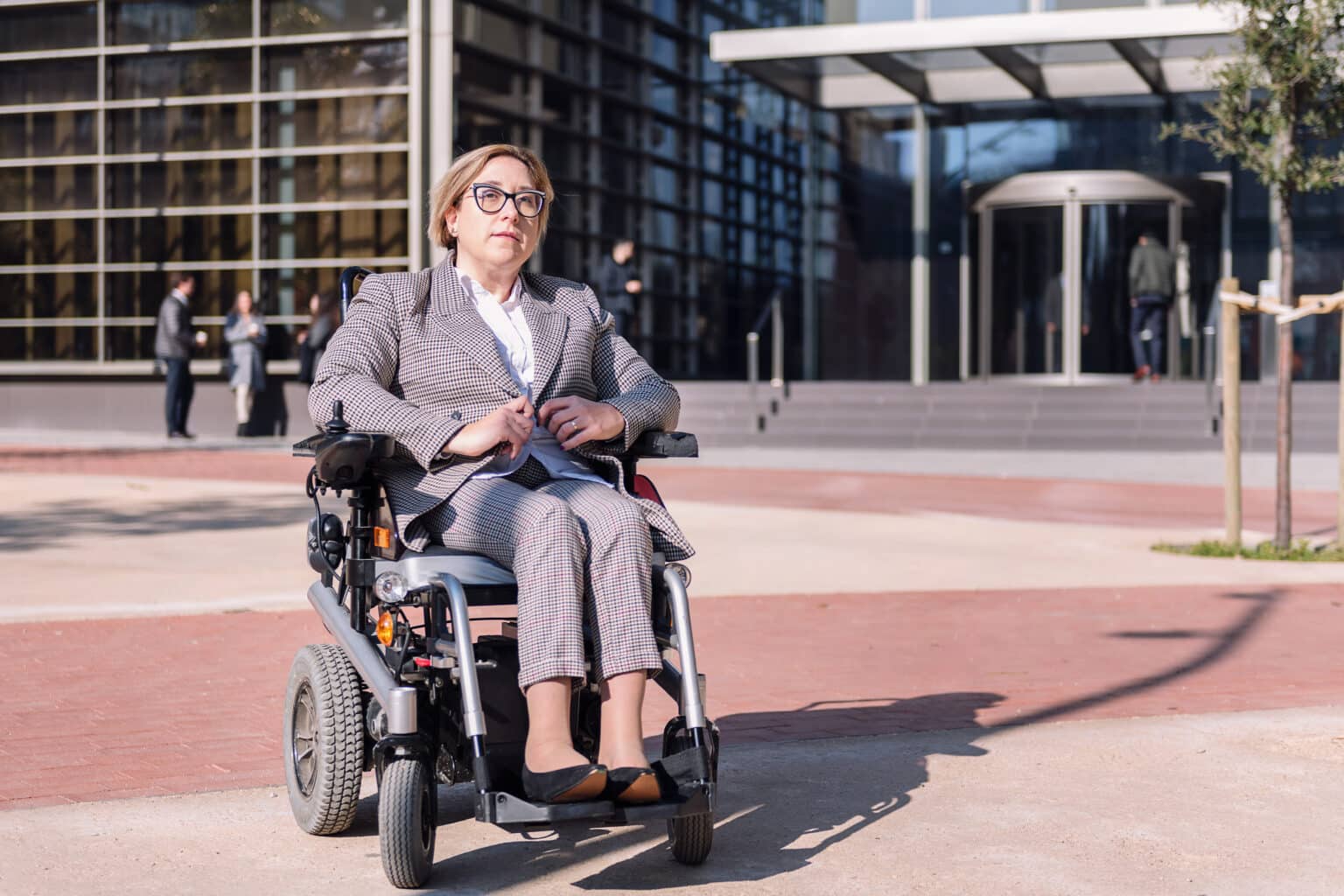 businesswoman using custom wheelchair